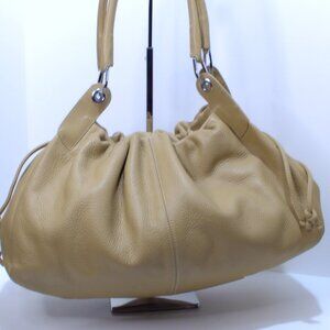 Gianni Chiarini Tan Leather Hobo Leather bag with drawstring pulls on side.